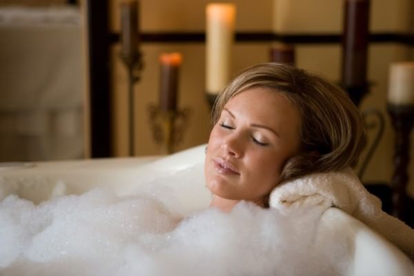 Lady having Caramel Marshmallow Body Scrub in Reflections Spa and Salon at Lake Buena Vista Resort Village & Spa