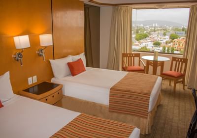 Relaxing two beds rooms in Hotels Grupo Guadalajara