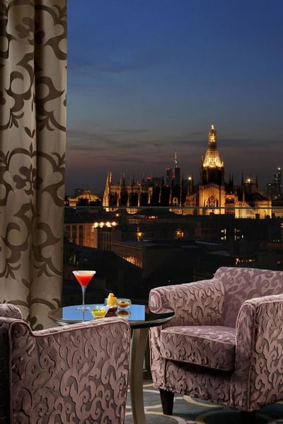 Night sky & city view from a balcony at Uptown Palace Milan