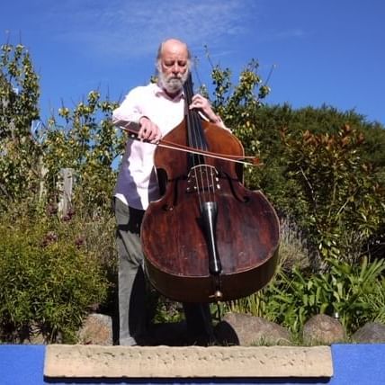 Man playing a double bass violin at Freycinet Lodge