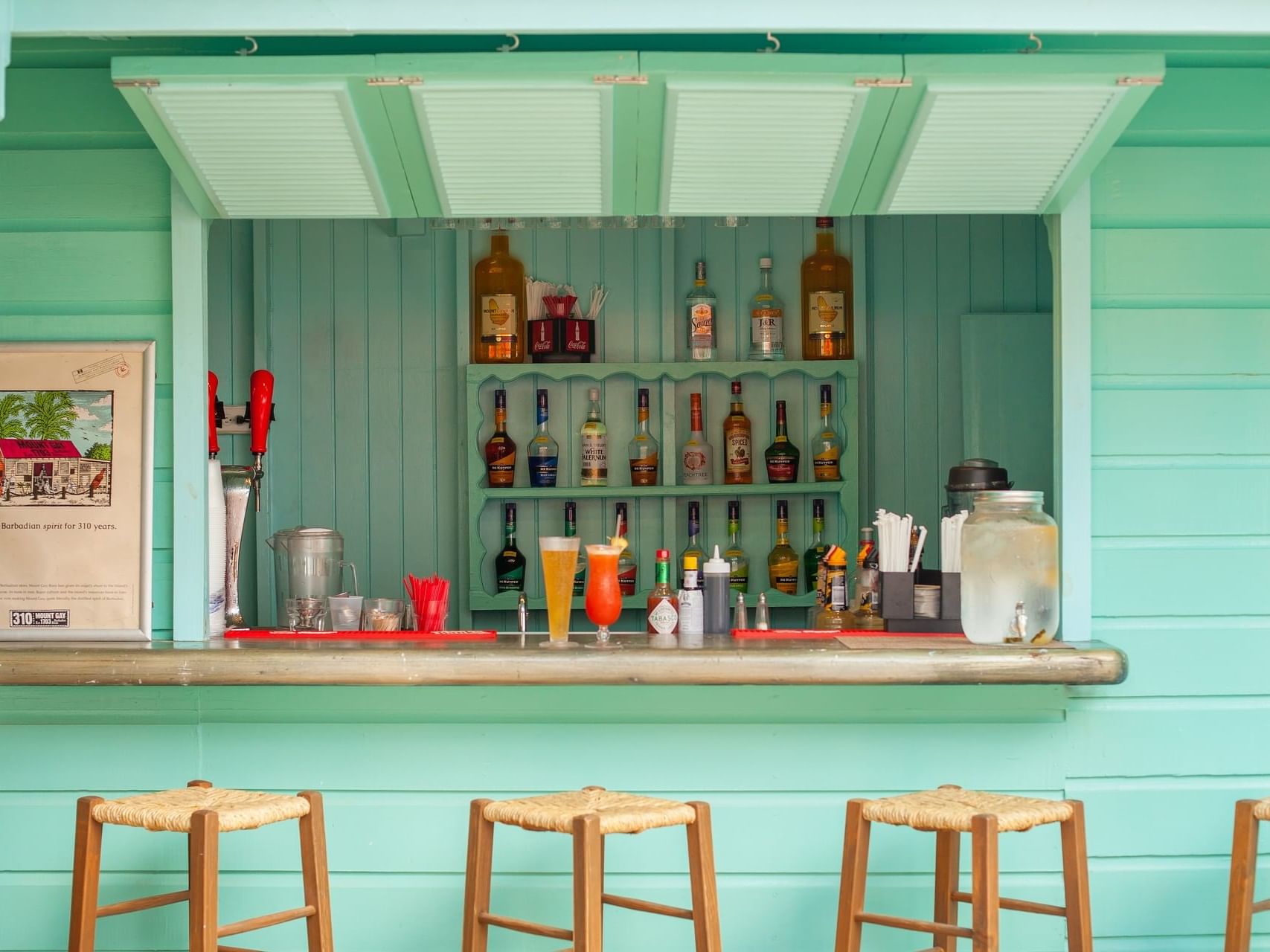 Closeup on the bar counter in the Colin's Rum Shop at Sugar Bay