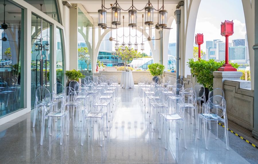 Outdoor event space with rows of transparent chairs in The Clifford Pier at The Fullerton Bay Singapore