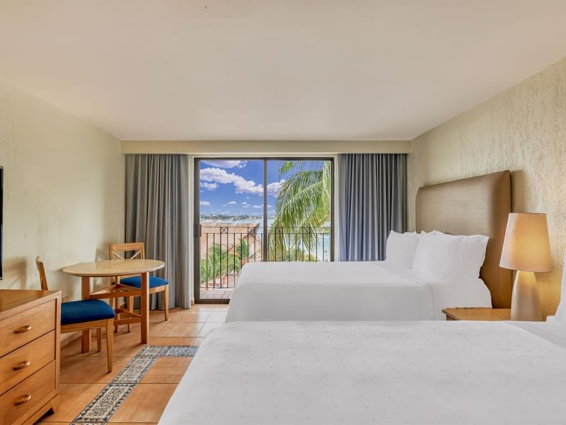 2 double beds & balcony in Master Suite at Fiesta Americana