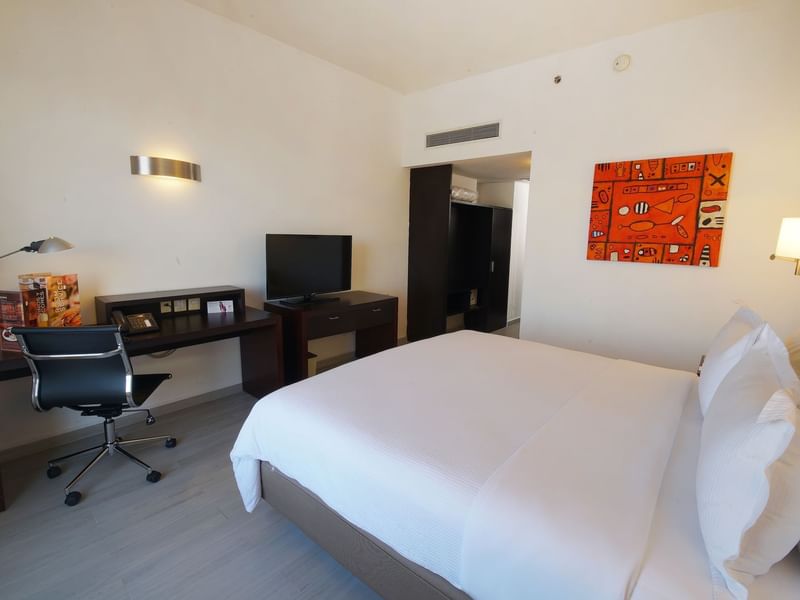 Interior of Superior Room with working desk at Fiesta Inn