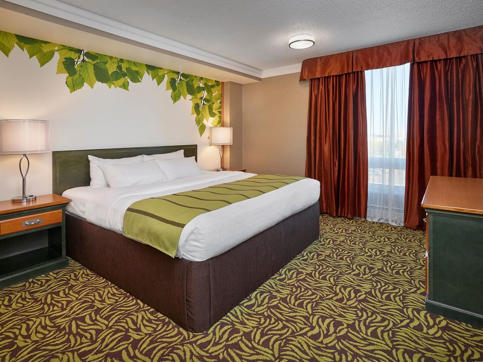 King bed, work desk & carpeted floor in King Suite at Varscona Hotel on Whyte