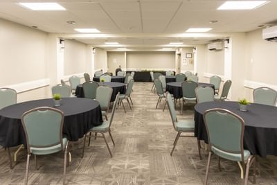 Large empty conference room with round tables set up at the top meeting room, Moncton, in Hotel Rodd Moncton