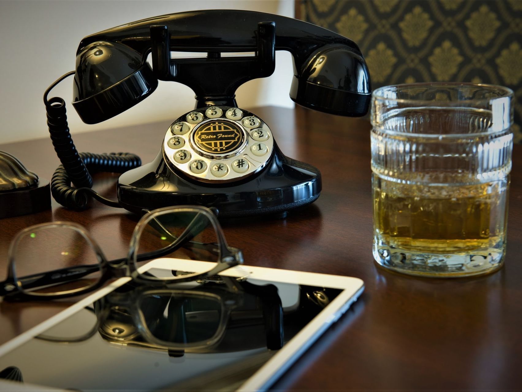 Old telephone on a concierge desk at Hotel at Old Town Wichita