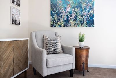 Cozy lounger with side cupboards & wall arts in Queen Premiere at Retro Suites Hotel