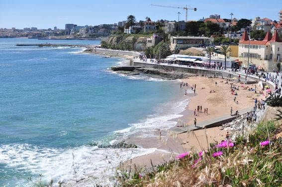 Aerial view of people by the Poça Beach near Hotel Cascais Miragem Health & Spa