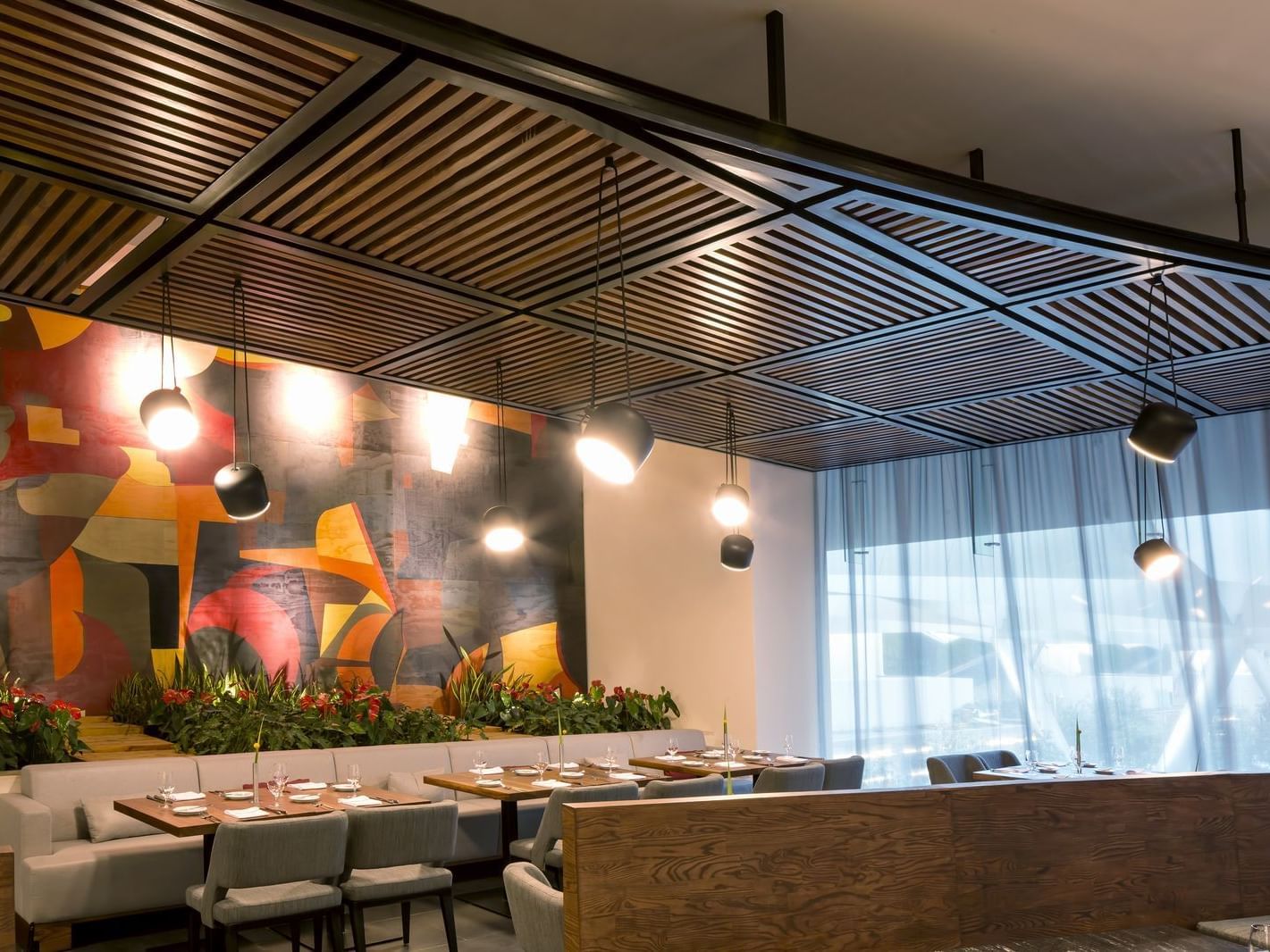 Close-up of a booth in Restaurant 1521 at La Colección Resorts