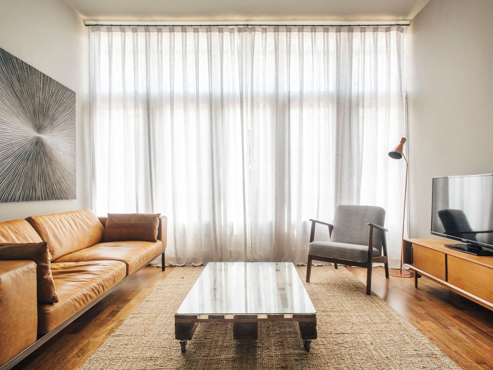 Living area in deluxe room at Barcelona Apartment