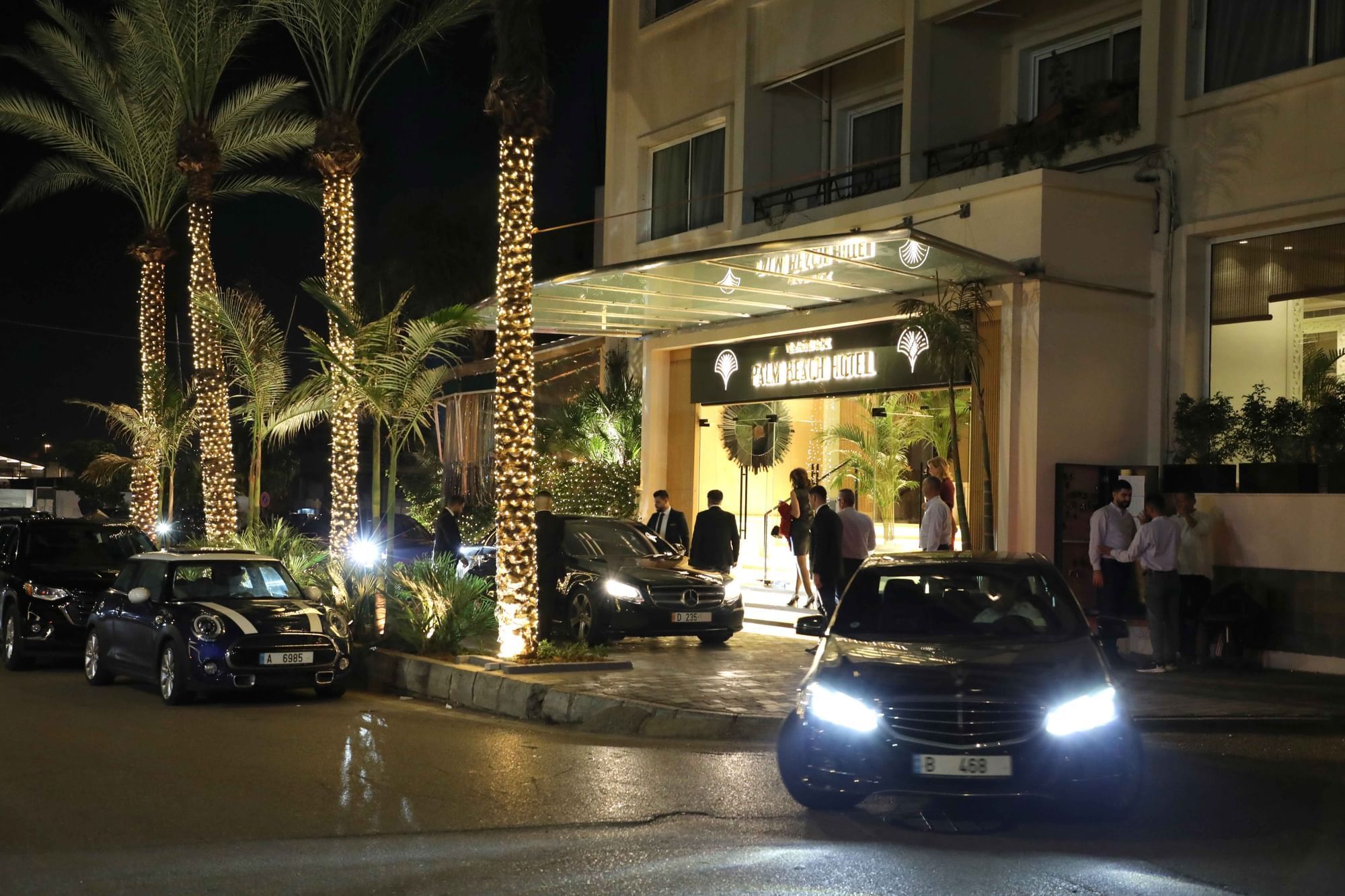 Crowded entrance of Warwick Palm Beach Hotel - Beirut at night