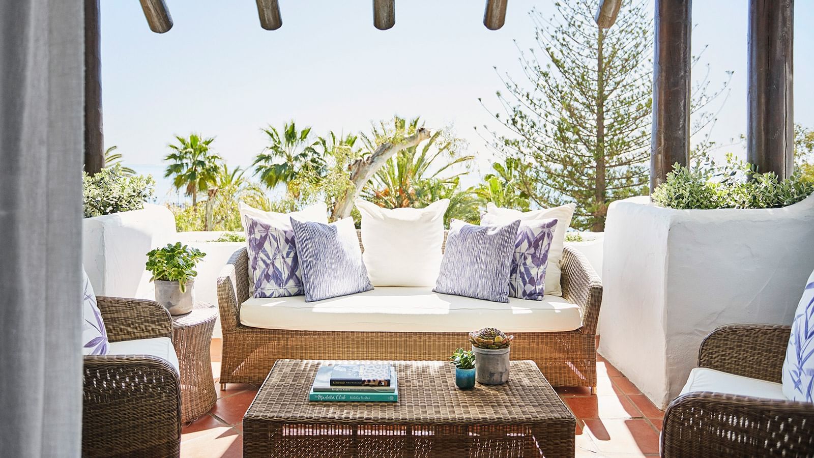 Sitting area in a balcony at a room in Marbella Club Hotel