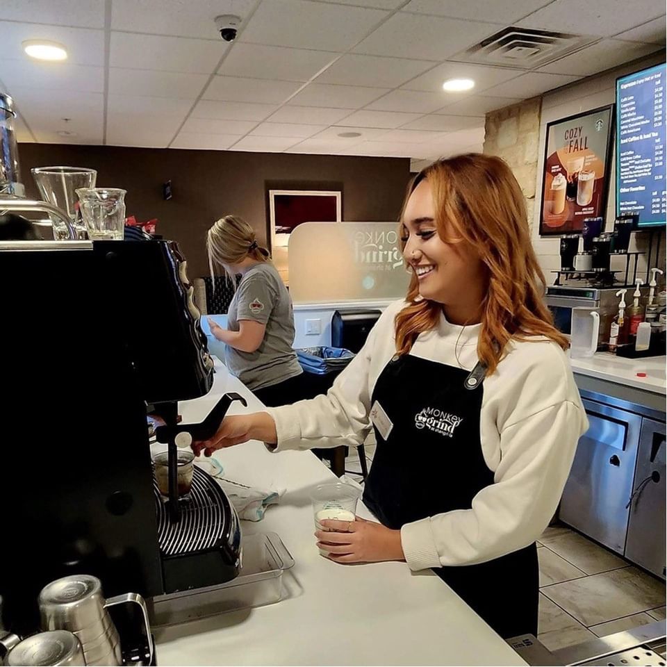 Barista by the counter in Monkey Grind at Shangri-La Monkey Island