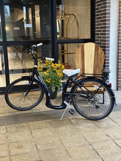 a bike parked in front of a door