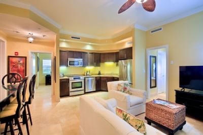 Living room and pantry area in 1 Bedroom Suite at Windsong Resort On The Reef