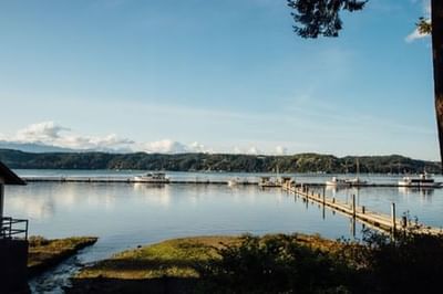 Scenic lake view with mountain backdrop at Alderbrook Resort & Spa
