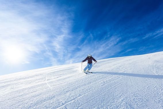 A person sliding on the snow at Kiroro Resort near Grand Park Otaru