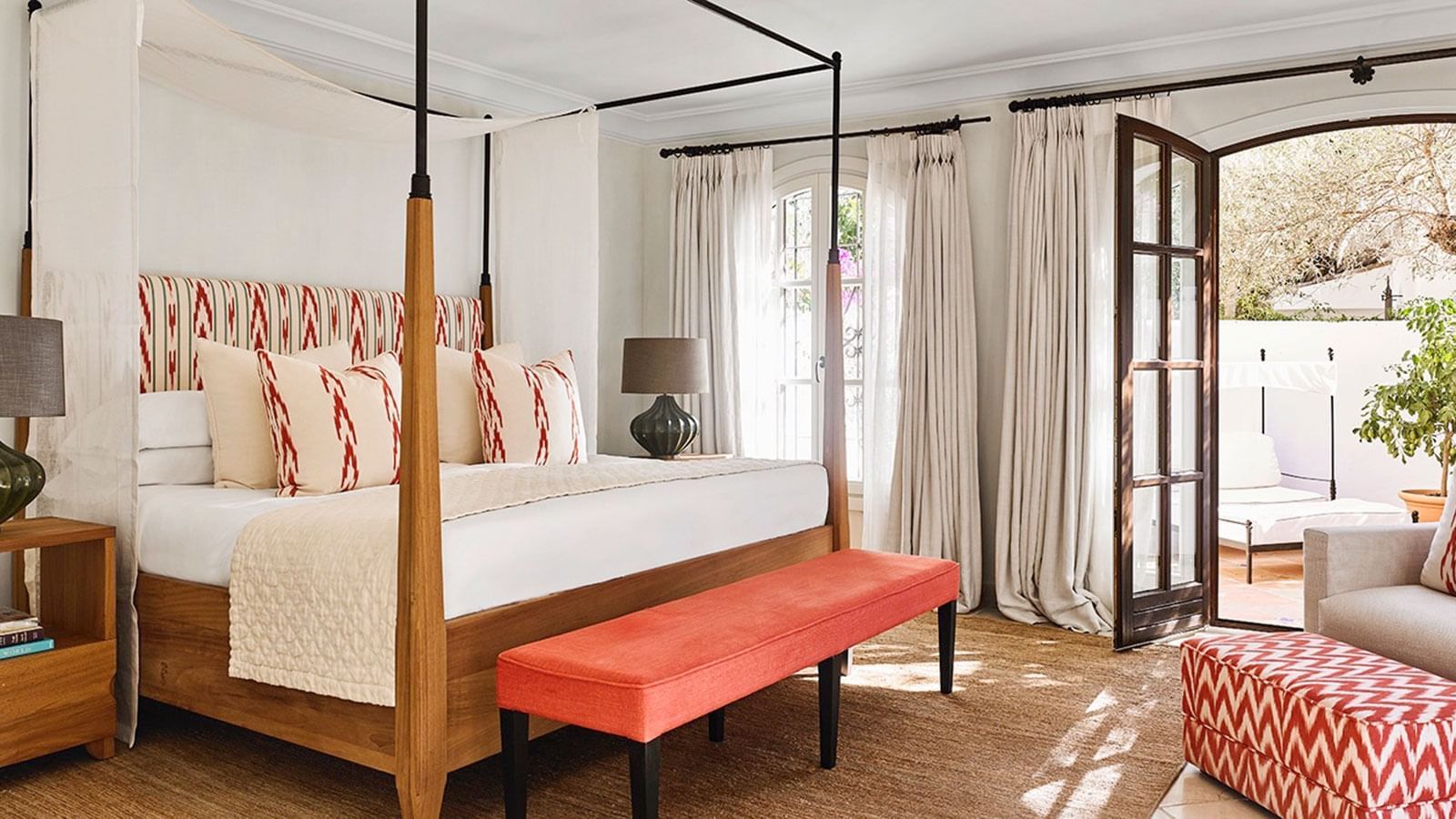 Bed & furniture in a Two-Bedroom Bungalows at Marbella Club