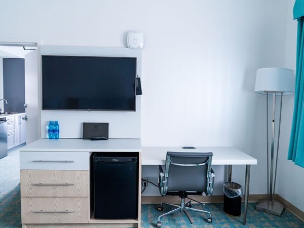 TV and desk in hotel room