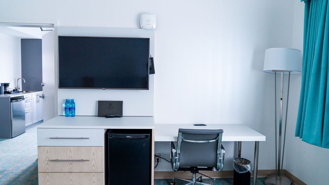 TV and desk in hotel room
