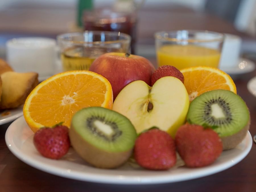 Closeup of the fruit plate & juice glasses at Hotel Admiral's