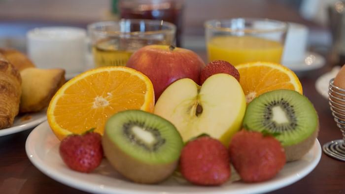 Closeup of the fruit plate & juice glasses at Hotel Admiral's
