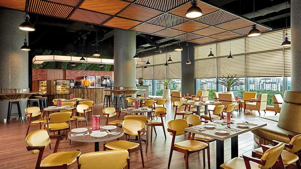 Dining area & lounge in Kaffeinate at Sunway Hotels & Resorts