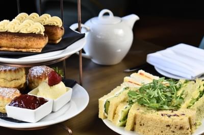 afternoon tea cakes, sandwiches and scones at easthampstead park in wokingham