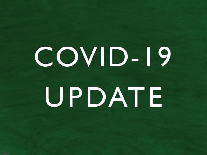 A banner that shows Covid 19 update at Maitria Hotels