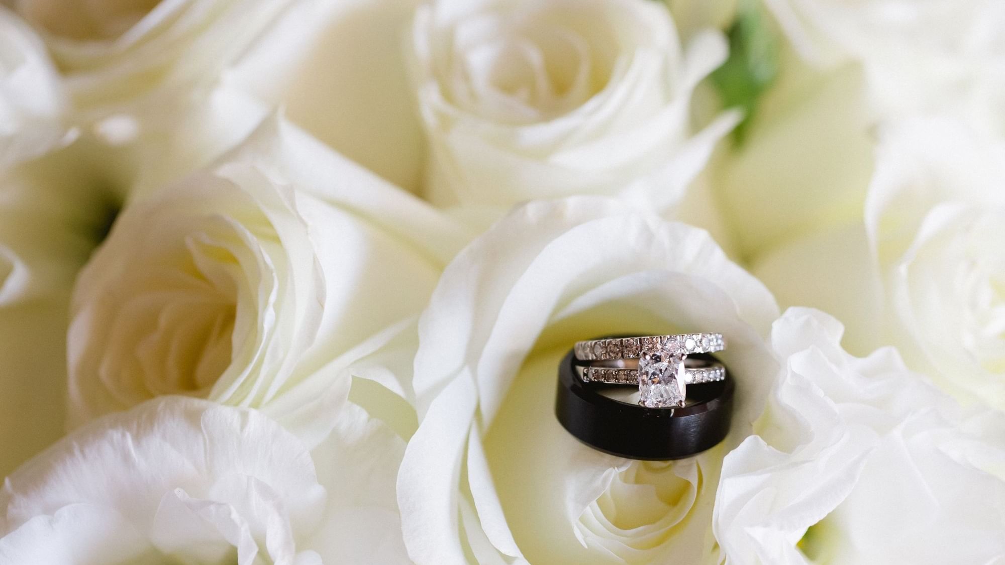 Close-up of flower bouquet with wedding ring at Fiesta Americana