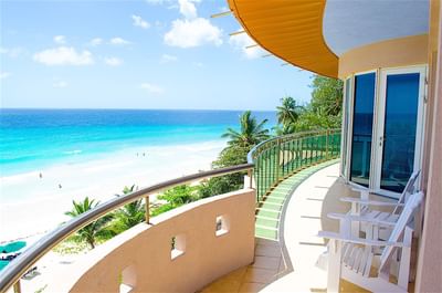 Room balcony lounge overlooking the sea on a sunny day at Accra Beach Hotel & Spa