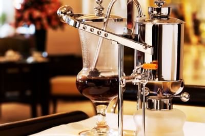 Closeup of a coffee maker in a restaurant at Goodwood Hotel
