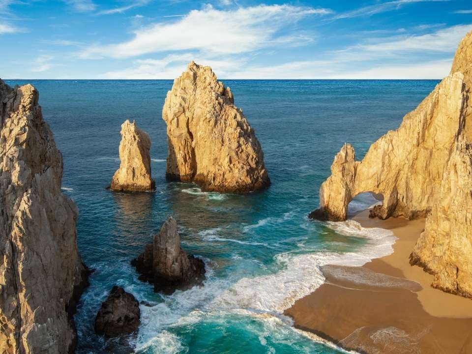 Stone arch at the sea near Cabo Villas Beach Resort