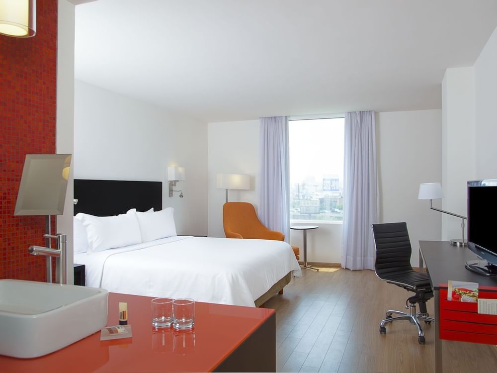 Interior of Superior Room with king bed at Fiesta Inn