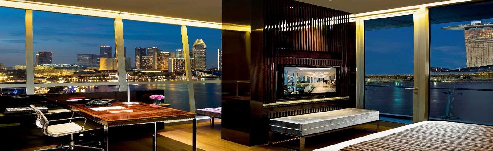 Working area in suite with city view at The Fullerton Bay Singapore