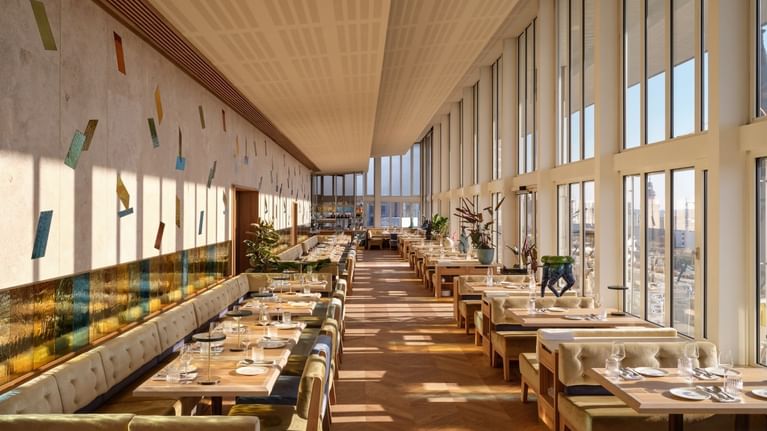 Dining tables in a restaurant at Flemings Selection Frankfurt