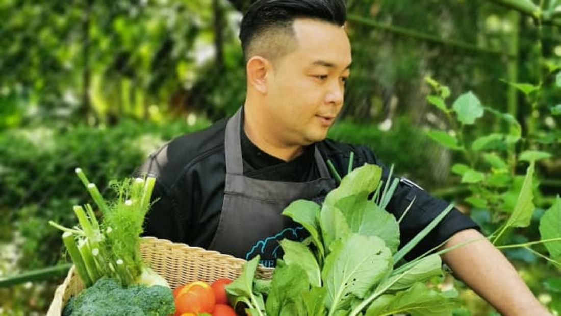 Picking crops from Chef Boon's Organic Garden near The Banjaran Hotsprings Retreat
