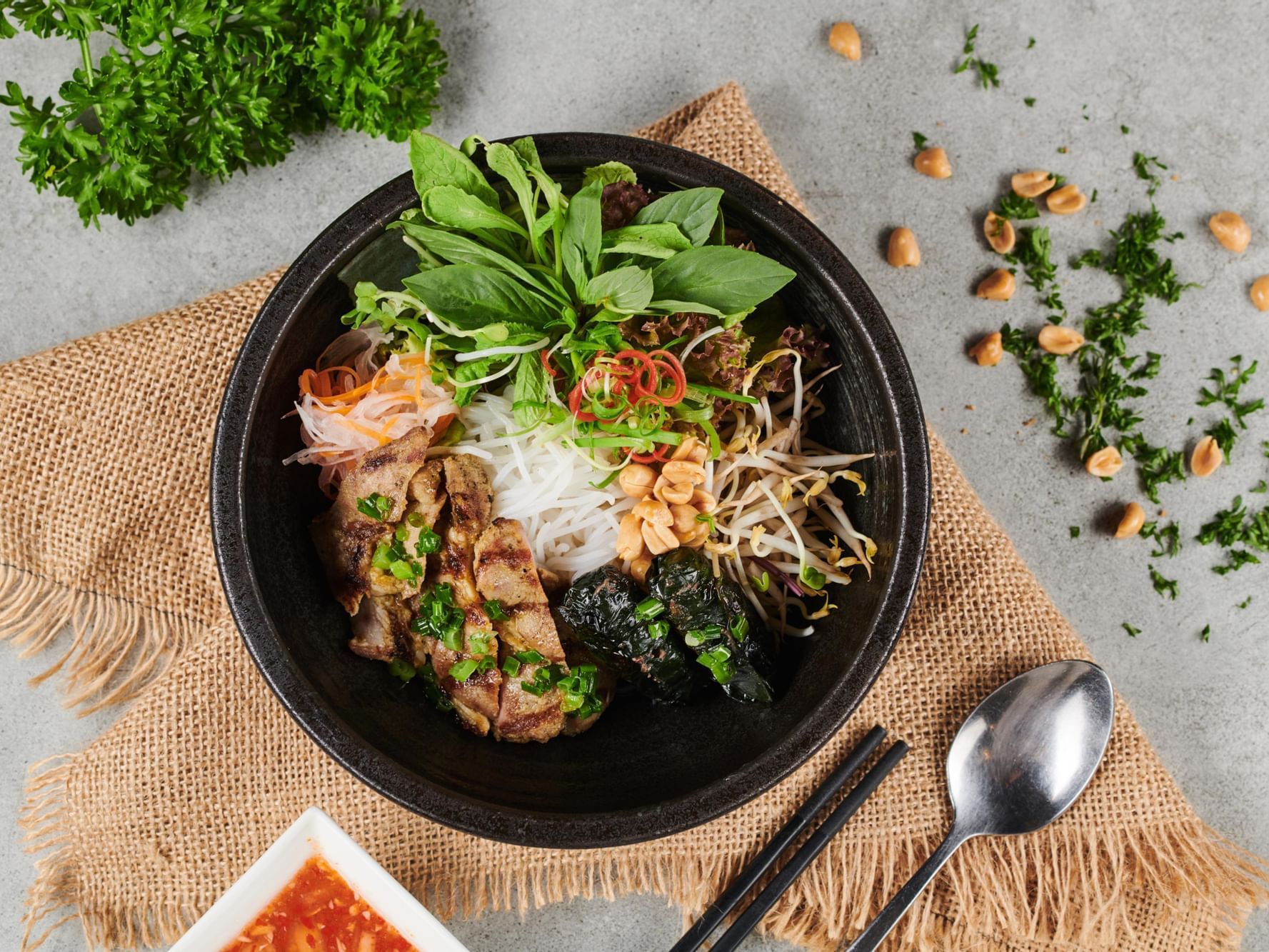 Ramen noodles bowl with chicken served in Cay Da Cafe at Eastin Grand Hotel Saigon