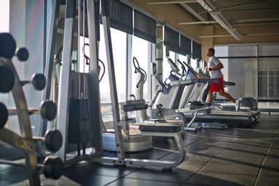 A man jogging on a treadmill