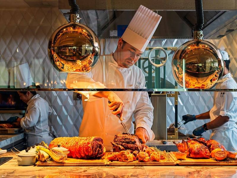 Chef cooking in Epicurean at Crown Towers Sydney