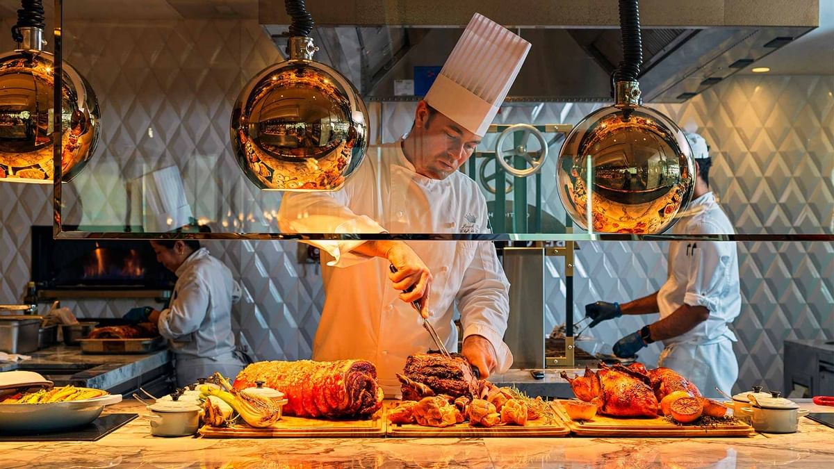 Chef cooking in Epicurean at Crown Towers Sydney