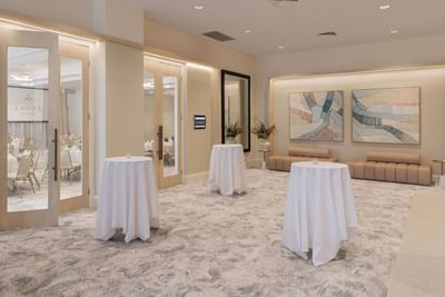 Round tables arranged in meeting room at Amora Hotel Brisbane