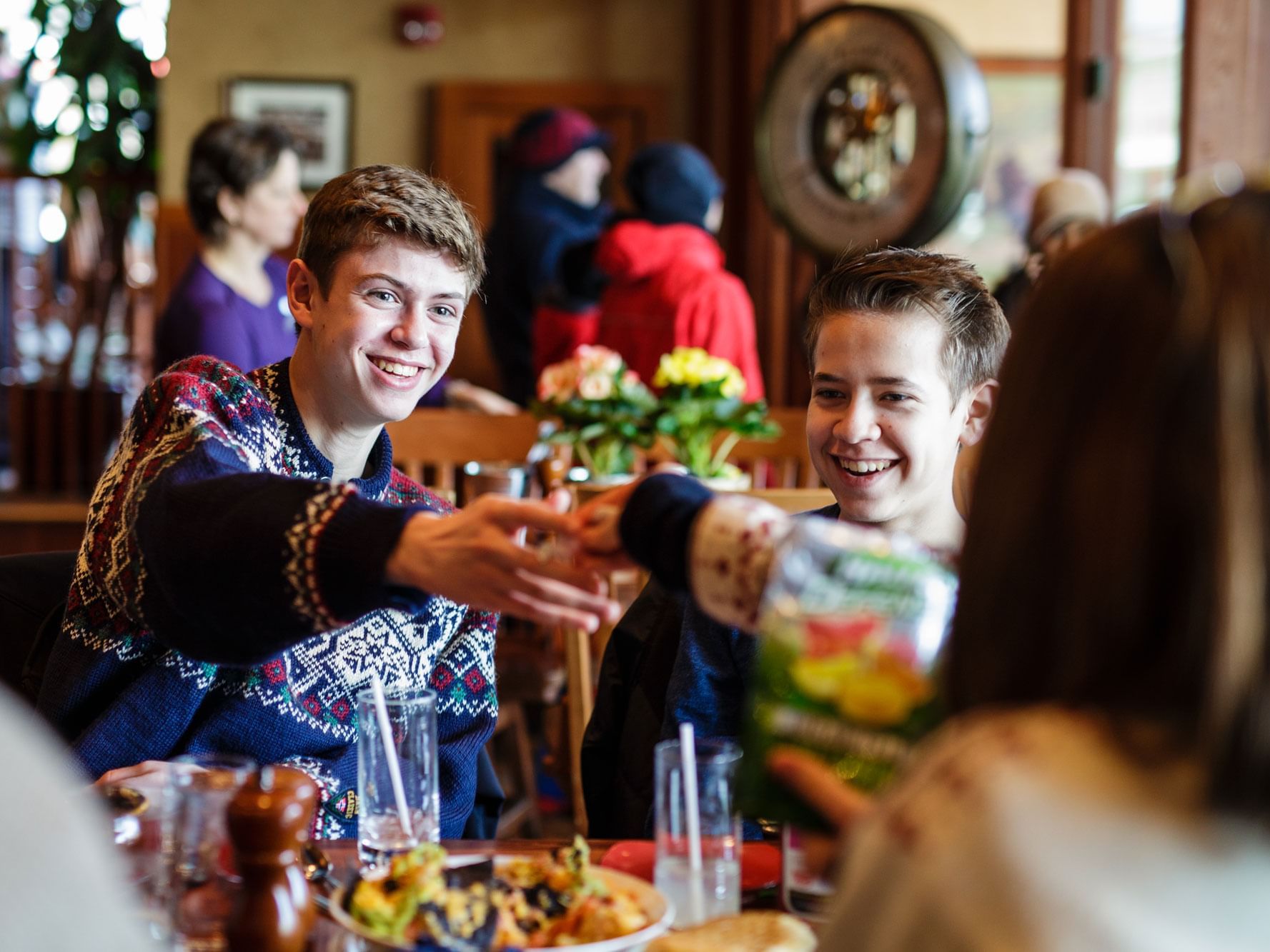 Teenagers enjoying their meals at The Lake House