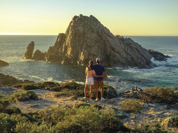 Couple at Sugarloaf Rock near Pullman Bunker Bay Resort