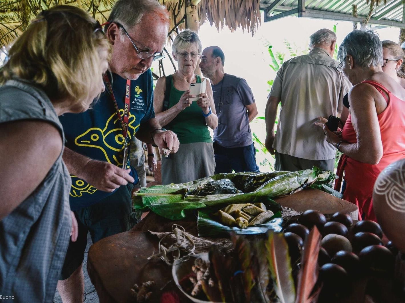 Visitors enjoying native food near Rio Celeste Hideaway