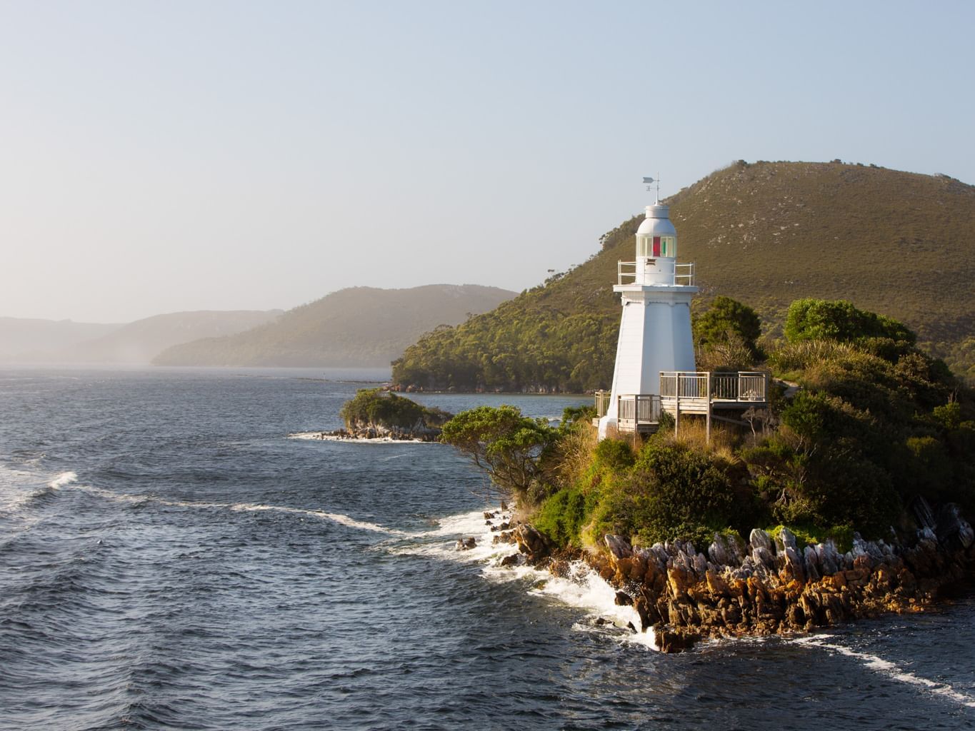 Landscape view of a lighthouse near Gordon River Cruise