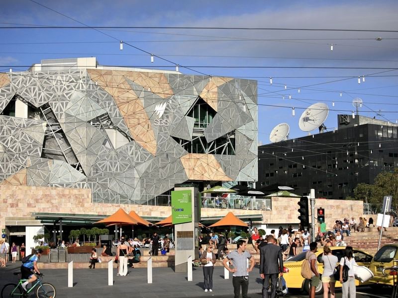 Crowded Federation Square near Pullman Melbourne City Centre