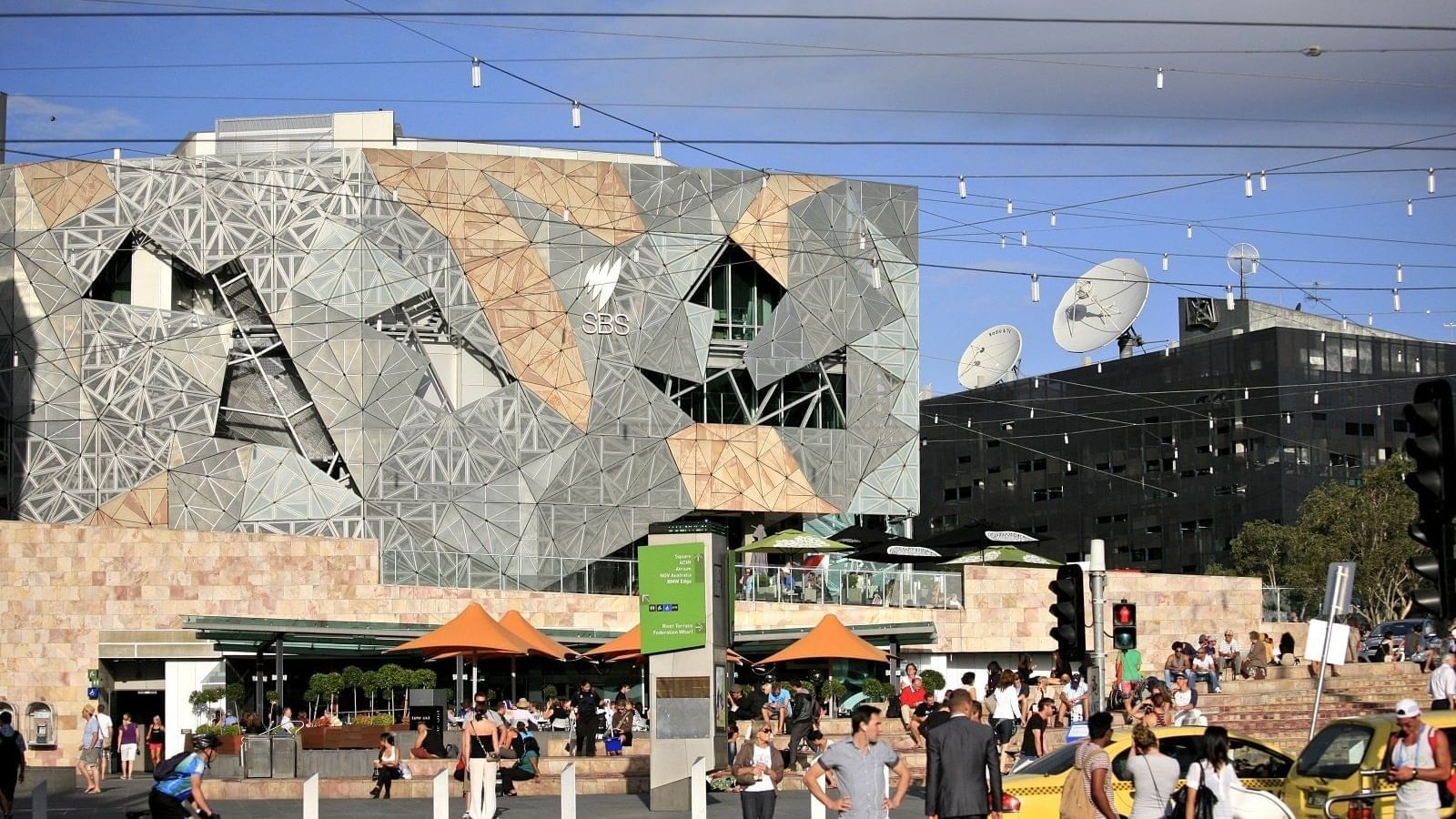 Crowded Federation Square near Pullman Melbourne City Centre