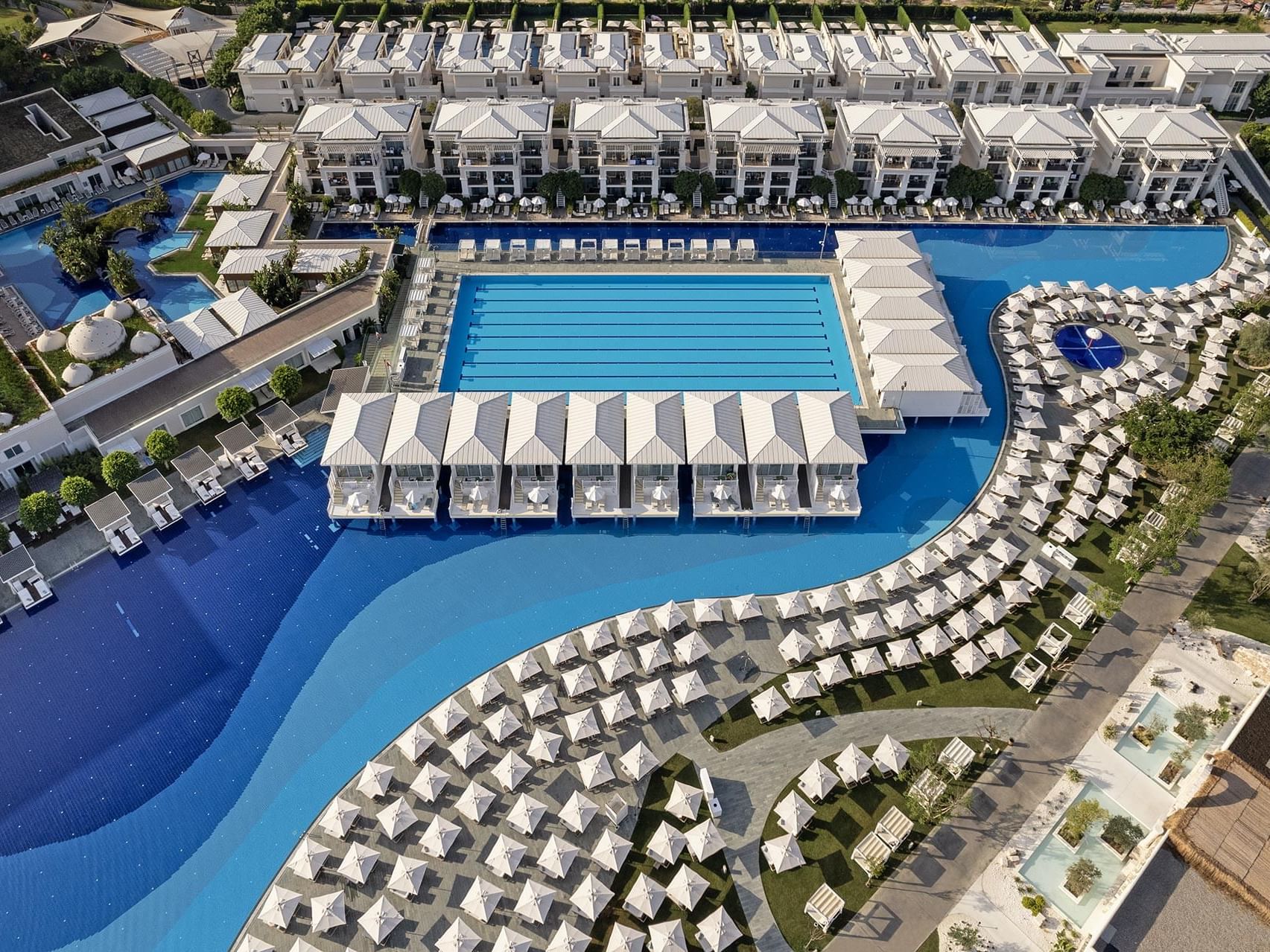 Aerial view of Titanic Deluxe Golf Belek with outdoor pool area and sunbeds